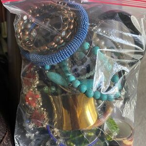 Bag of preowned bracelets